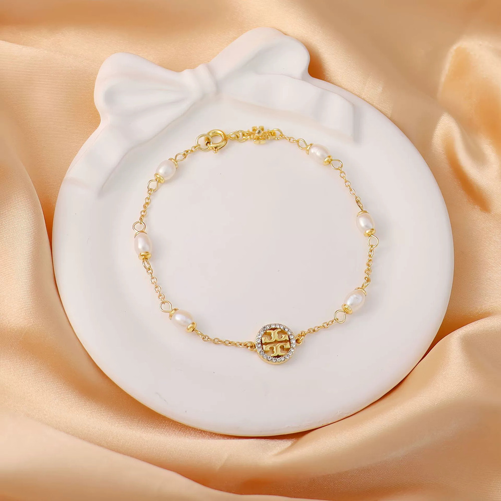 Tory Burch Gold Plated Brass Double Strand Dense Set Round Pearl Bracelet